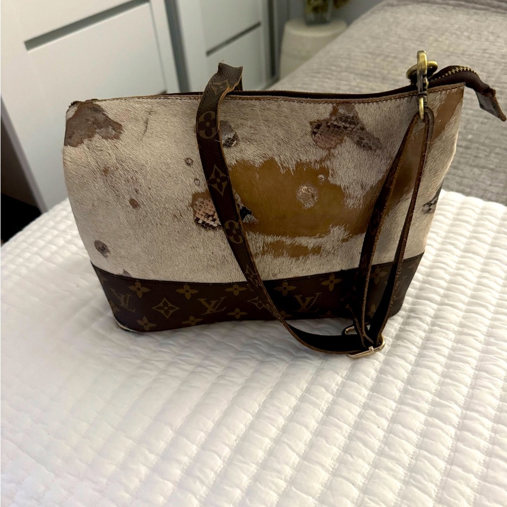 repurposed Louis Vuitton one of a kind piece with monogram LV and calfskin.